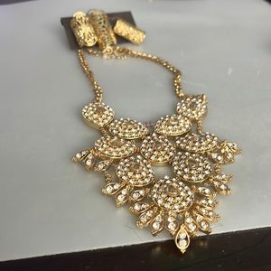 Gorgeous golden necklace with rhinestones